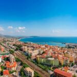 Panoramic sea landscape with Formia, Lazio, Italy. Scenic resort town village with nice sand beach and clear blue water. Famous tourist destination in Riviera de Ulisse